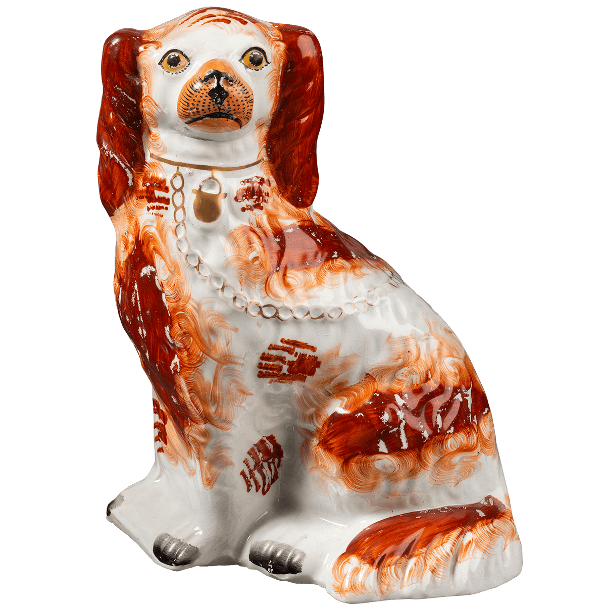 Beeldje van een Staffordshire dog, met bruine en oranje kleuren